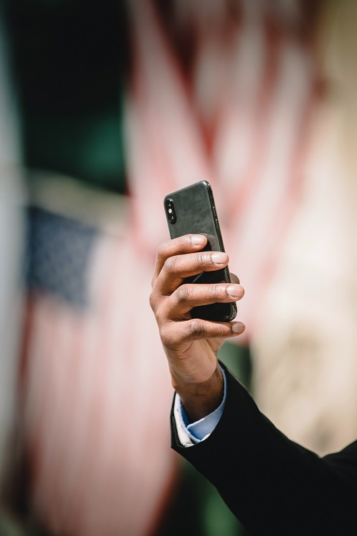 man holding cellphone