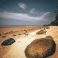 photo-of-rocks-on-seashore