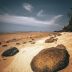 photo-of-rocks-on-seashore