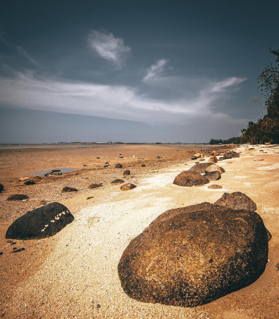 photo-of-rocks-on-seashore